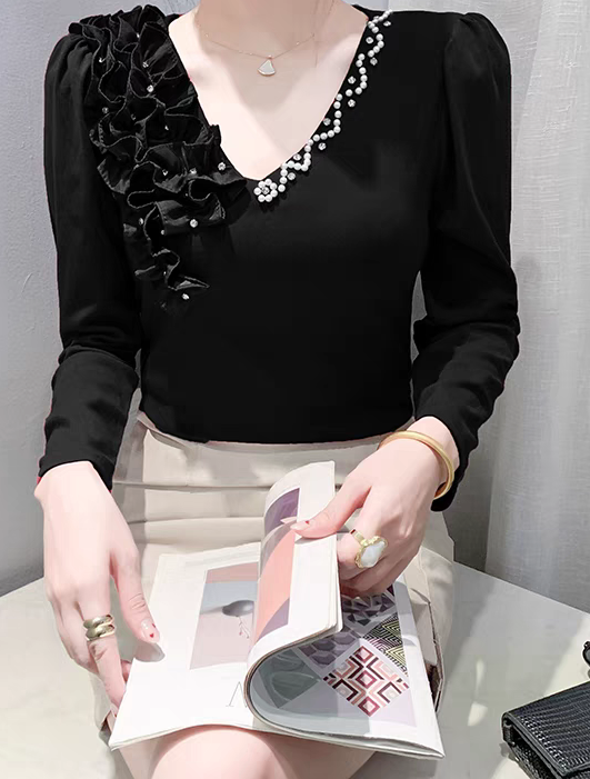 Maglia elegante con dettagli eleganti da donna